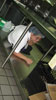 Wilma Loja, a Special Diet Assistant with the Dietetic Services Department at the Guam Memorial Hospital Authority, takes cover under her work station in the kitchen.