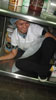 Food Service Worker Roche Bonita, fits properly under the kitchen counter of her work area when taking cover for the Shake Out drill.