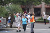 A City employee directng patrons from City Hall.