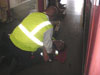 Omnitrans maintenance supervisor Veto Espinoza demonstrates a medical assessment on mechanic Jay Alva after the shaking stopped.